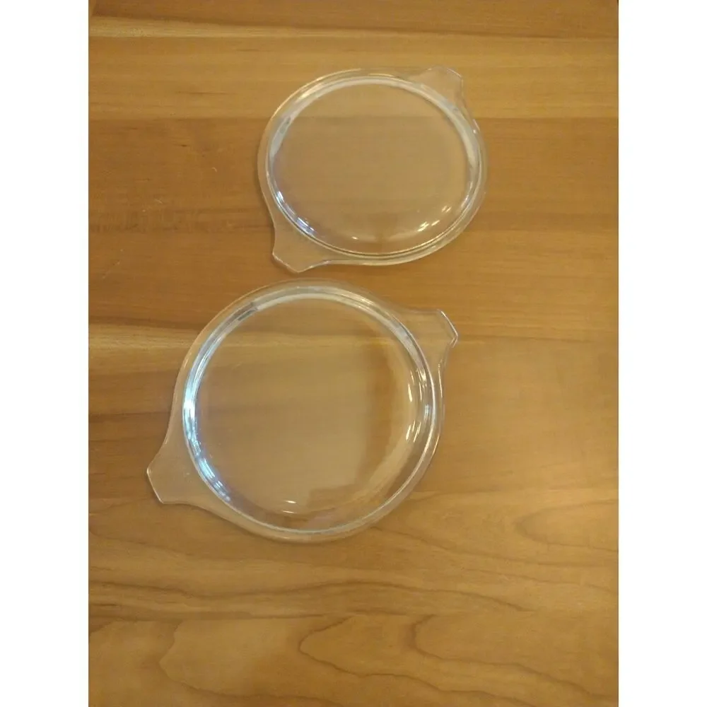 Two Pyrex 24 470-C Clear Glass Lids 6 1/4 